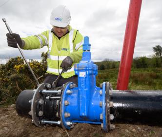 Uisce Éireann worker fixing a watermain